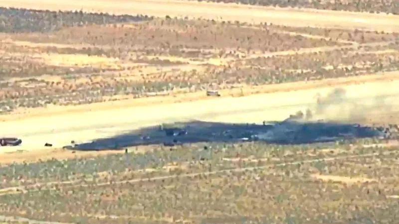 The still image from a video shows emergency services at the crash site in California. The still image from a video shows emergency services at the crash site in California.