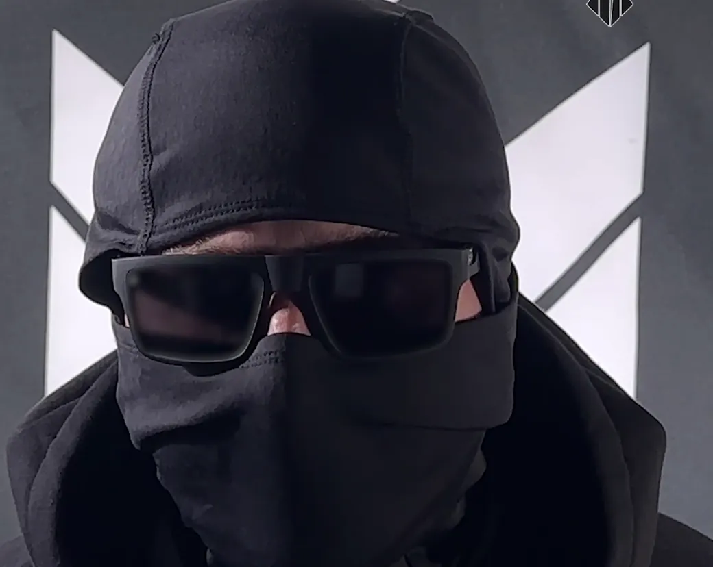 A masked man speaks on Telegram about the group's acts of sabotage "Black Russians". A masked man speaks on Telegram about the group's acts of sabotage "Black Russians".